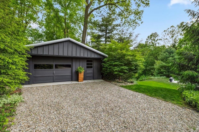 16128 Walnut Ct, Three Oaks, MI 49128 - garage featuring driveway