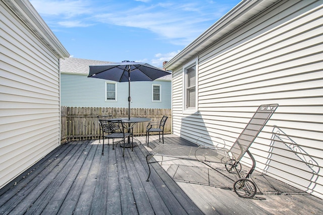 501 Sherwood Ave, Three Oaks, MI 49128 - wooden terrace featuring outdoor dining space