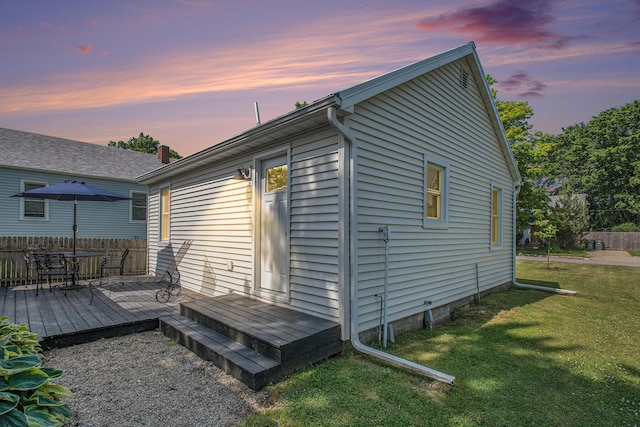 501 Sherwood Ave, Three Oaks, MI 49128 - back of property at dusk with a wooden deck