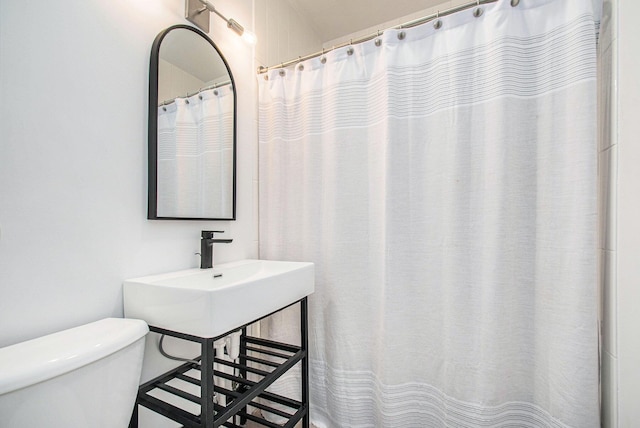 501 Sherwood Ave, Three Oaks, MI 49128 - bathroom with toilet and curtained shower