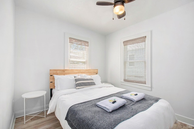 501 Sherwood Ave, Three Oaks, MI 49128 - bedroom featuring wood finished floors and a ceiling fan