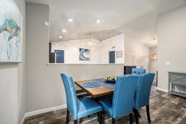 25220 Forest Ln, Mattawan, MI 49071 - dining room featuring wood finished floors, lofted ceiling, recessed lighting, and a chandelier