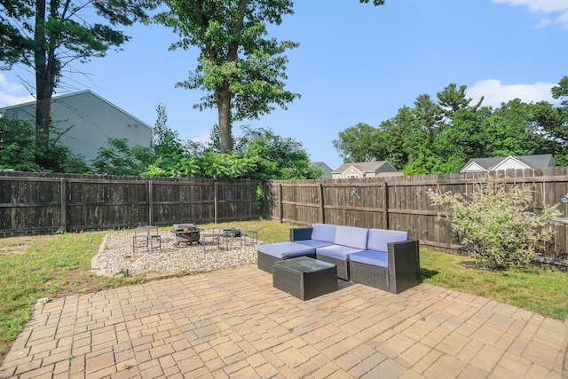 25220 Forest Ln, Mattawan, MI 49071 - fenced backyard featuring a patio and an outdoor living space with a fire pit
