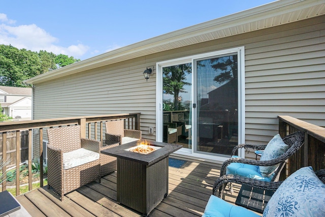 25220 Forest Ln, Mattawan, MI 49071 - wooden terrace with an outdoor fire pit
