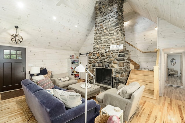 2821 Lakeshore Rd, Lexington, MI 48450 - living area featuring high vaulted ceiling, hardwood / wood-style flooring, wooden walls, and wooden ceiling