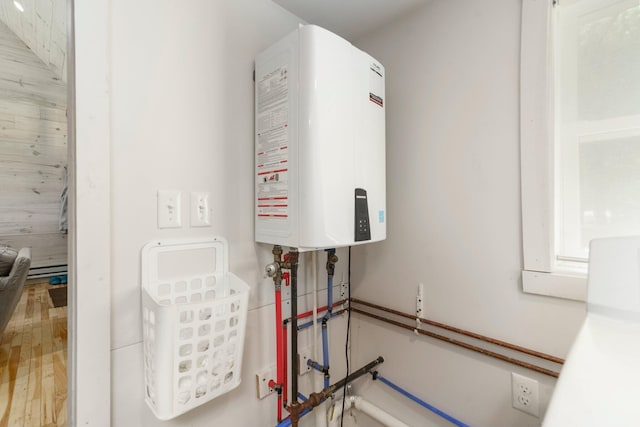 2821 Lakeshore Rd, Lexington, MI 48450 - utility room with water heater
