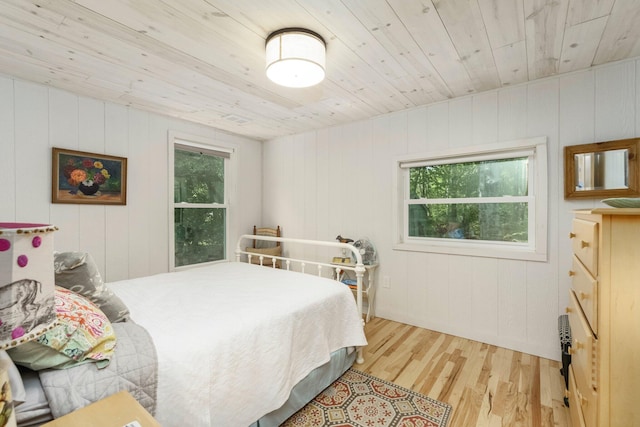 2821 Lakeshore Rd, Lexington, MI 48450 - bedroom with wood ceiling and wood finished floors