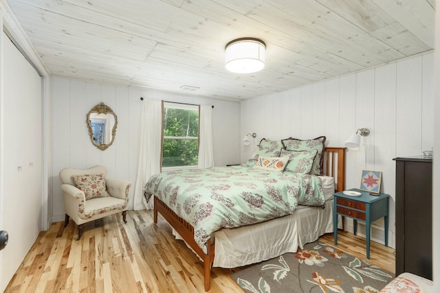 2821 Lakeshore Rd, Lexington, MI 48450 - bedroom featuring wood finished floors and wooden ceiling
