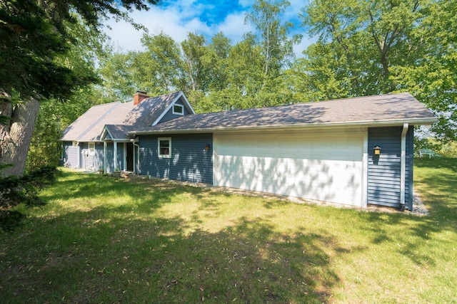 2821 Lakeshore Rd, Lexington, MI 48450 - rear view of house with a chimney and a lawn