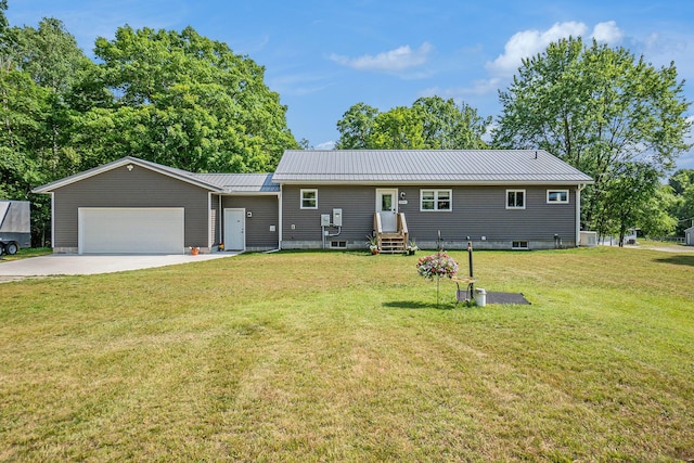 2480 S 148th Ave, Hesperia, MI 49421 - ranch-style home with concrete driveway, a metal roof, a garage, and a front yard