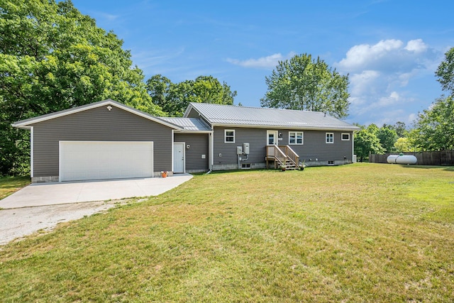 2480 S 148th Ave, Hesperia, MI 49421 - ranch-style house featuring concrete driveway, a garage, and a metal roof