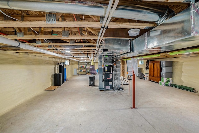 2480 S 148th Ave, Hesperia, MI 49421 - unfinished below grade area with heating unit and a water softener