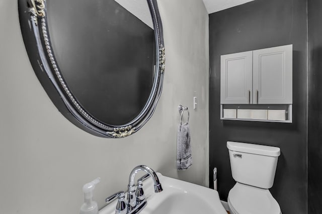 2200 Lindsey Rd, Jackson, MI 49201 - bathroom with toilet and a sink