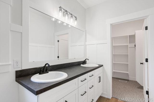 6322 Sheldon Dr, Hudsonville, MI 49426 - full bathroom with double vanity and a closet