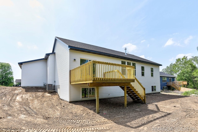 6322 Sheldon Dr, Hudsonville, MI 49426 - back of house with stairs and a deck