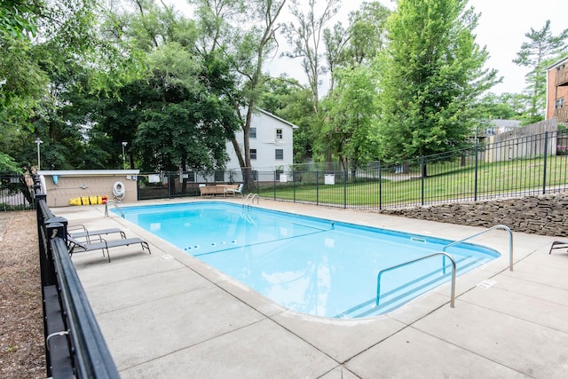 724 Garland Cir Unit D, Kalamazoo, MI 49008 - community pool featuring a patio area