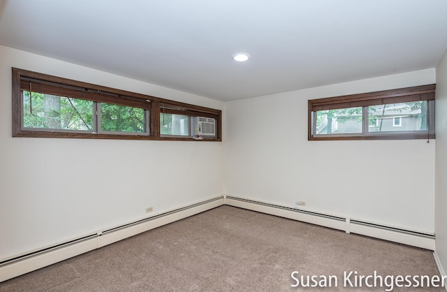 1129 Idema Dr SE, Grand Rapids, MI 49506 - carpeted spare room featuring healthy amount of natural light, recessed lighting, and baseboard heating