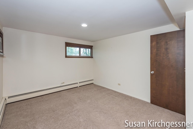 1129 Idema Dr SE, Grand Rapids, MI 49506 - unfurnished bedroom with baseboard heating, carpet, and recessed lighting