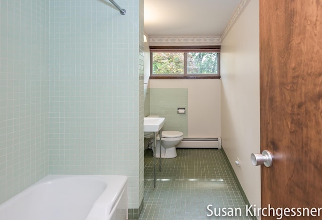1129 Idema Dr SE, Grand Rapids, MI 49506 - full bathroom featuring baseboard heating, tile patterned floors, tile walls, and shower / tub combination