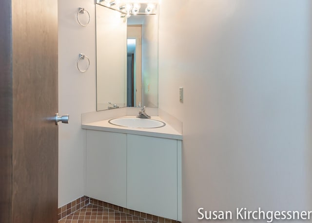 1129 Idema Dr SE, Grand Rapids, MI 49506 - bathroom with vanity and tile patterned flooring