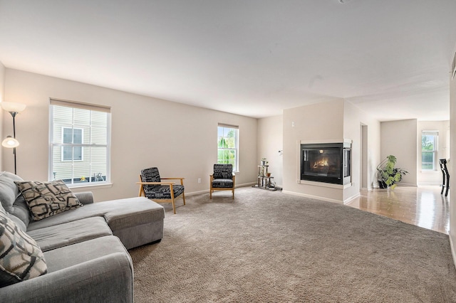 1735 Savannah Ln, Ypsilanti, MI 48198 - living room featuring carpet flooring and a multi sided fireplace