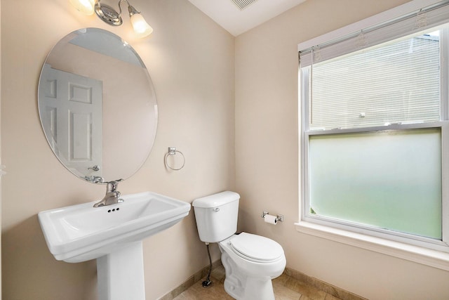 1735 Savannah Ln, Ypsilanti, MI 48198 - bathroom featuring healthy amount of natural light and tile patterned floors