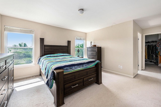1735 Savannah Ln, Ypsilanti, MI 48198 - bedroom with light carpet and multiple windows