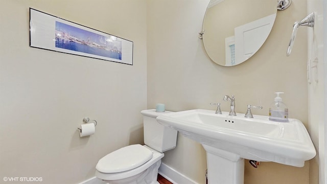 120 S Kenzie St, New Buffalo, MI 49117 - half bath with baseboards and toilet