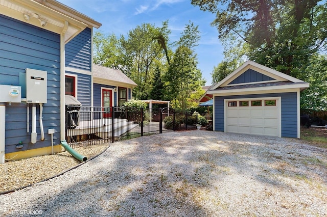120 S Kenzie St, New Buffalo, MI 49117 - detached garage featuring gravel driveway