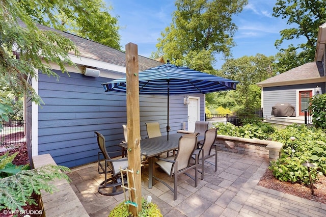 120 S Kenzie St, New Buffalo, MI 49117 - view of patio with outdoor dining space and grilling area