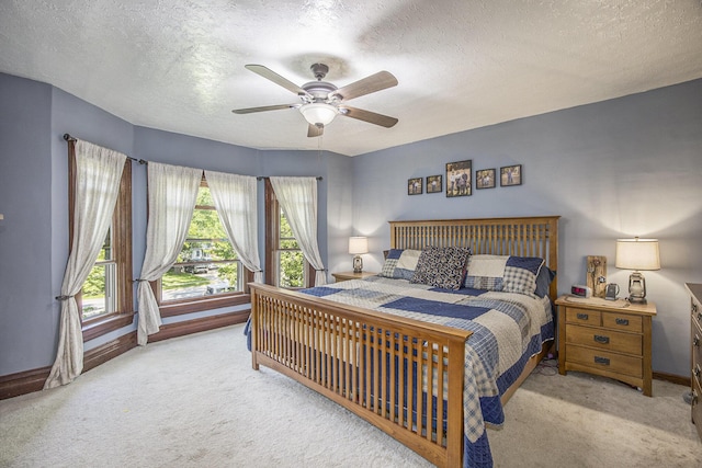 73640 Fulton St, Armada, MI 48005 - carpeted bedroom with multiple windows, a textured ceiling, and a ceiling fan
