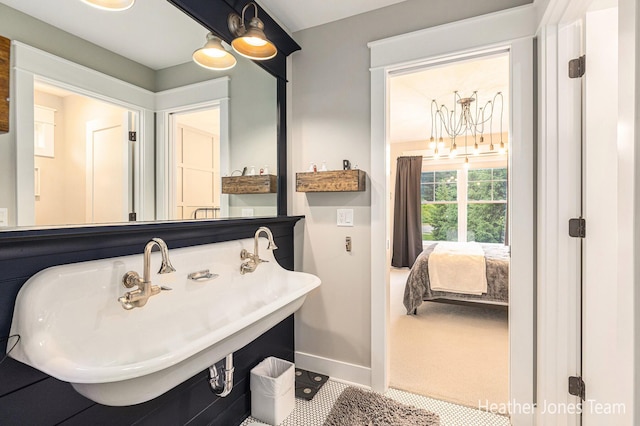 8069 Ella Terrace Ct, Rockford, MI 49341 - bathroom with baseboards and connected bathroom
