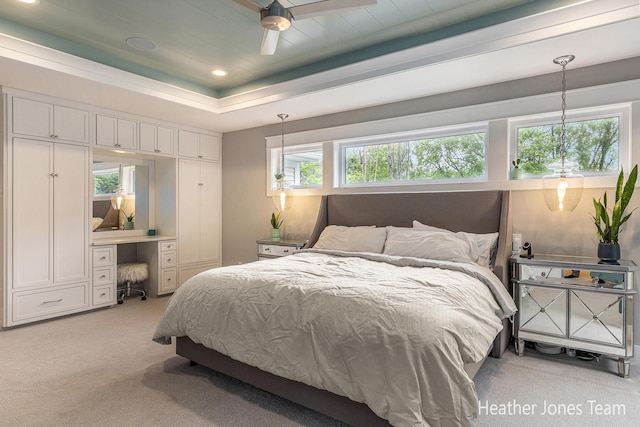 8069 Ella Terrace Ct, Rockford, MI 49341 - bedroom with light colored carpet, recessed lighting, a tray ceiling, built in study area, and a ceiling fan