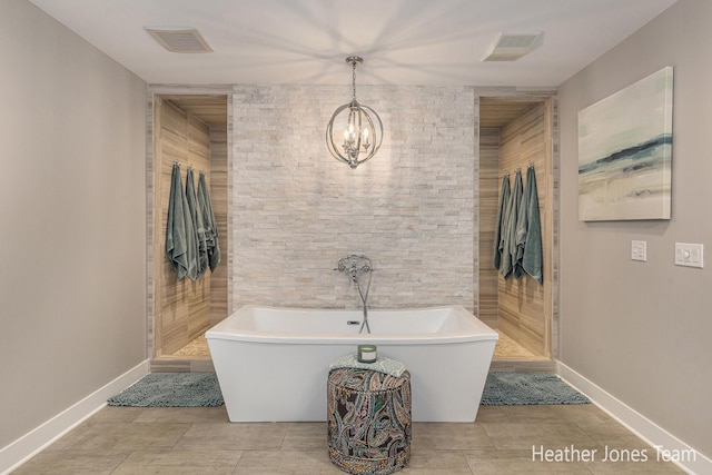8069 Ella Terrace Ct, Rockford, MI 49341 - full bath with a chandelier and a soaking tub