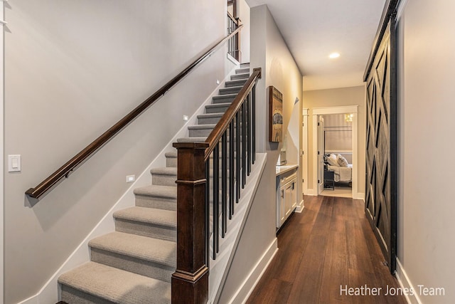 8069 Ella Terrace Ct, Rockford, MI 49341 - stairway with wood finished floors and recessed lighting