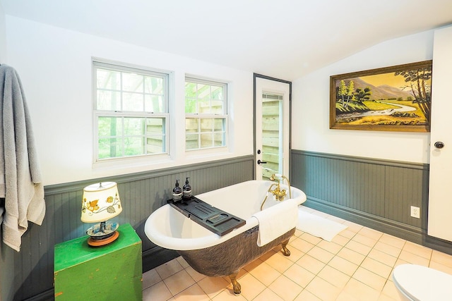 6670 Ravenswood Ave, Sawyer, MI 49125 - full bath with lofted ceiling, a wainscoted wall, and a freestanding bath