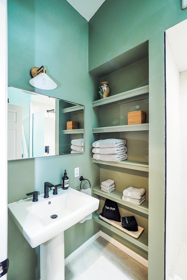 6670 Ravenswood Ave, Sawyer, MI 49125 - bathroom with a sink and tile patterned floors