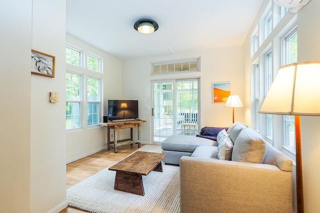 6670 Ravenswood Ave, Sawyer, MI 49125 - living room featuring light wood-style floors and baseboards