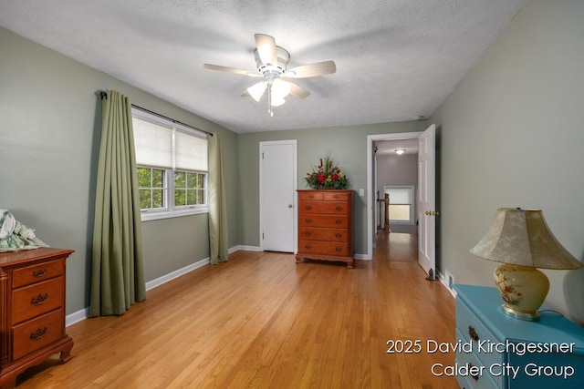 1052 Santa Cruz Dr SE, Grand Rapids, MI 49506 - bedroom featuring light wood finished floors and ceiling fan
