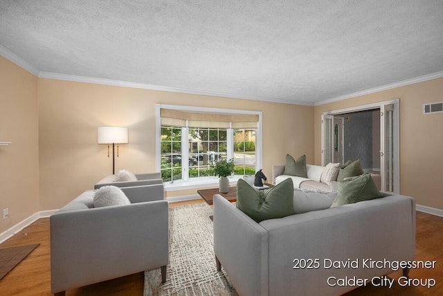 1052 Santa Cruz Dr SE, Grand Rapids, MI 49506 - living area with ornamental molding, a textured ceiling, and wood finished floors