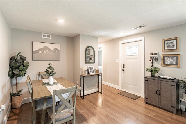 211 W S St, Grand Ledge, MI 48837 - dining area featuring light wood-style floors and recessed lighting
