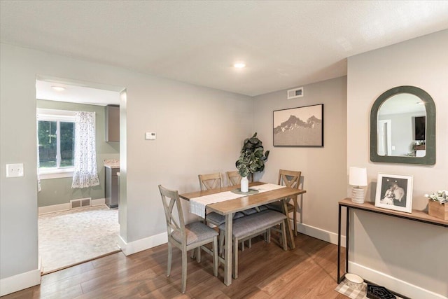211 W S St, Grand Ledge, MI 48837 - dining space with wood finished floors and recessed lighting
