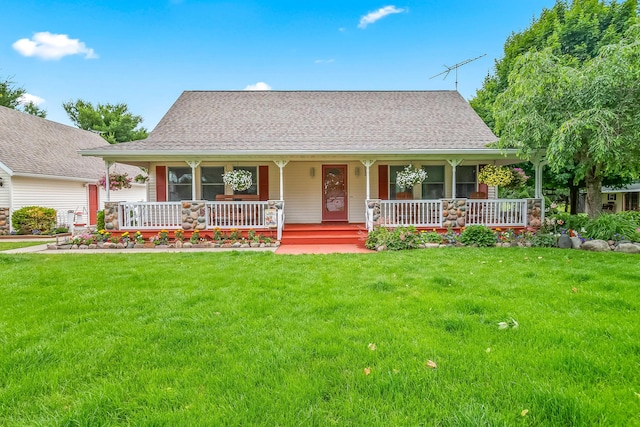 31688 Colon Rd, Colon, MI 49040 - view of front of house featuring a porch, a front lawn, and a shingled roof