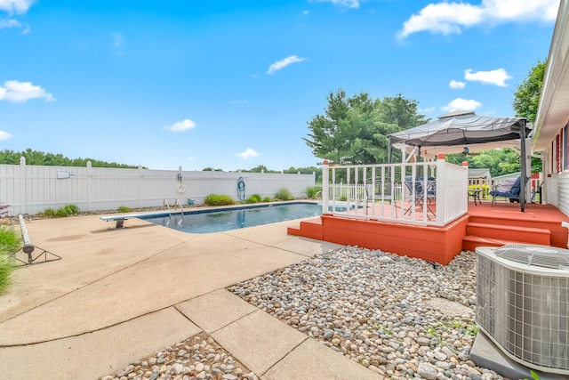 31688 Colon Rd, Colon, MI 49040 - view of swimming pool with a gazebo, a fenced backyard, a wooden deck, and a patio
