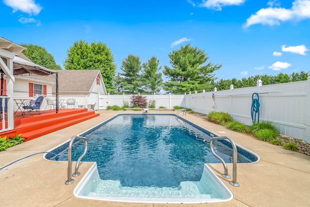 31688 Colon Rd, Colon, MI 49040 - view of pool with a fenced backyard, a wooden deck, and a patio