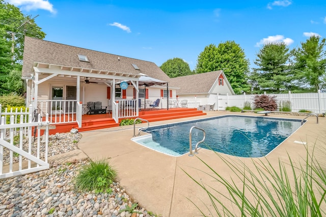 31688 Colon Rd, Colon, MI 49040 - view of pool with a fenced backyard, a wooden deck, a ceiling fan, and a patio