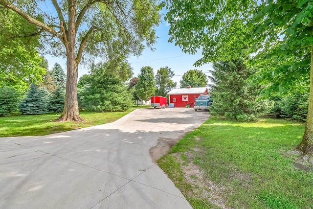 31688 Colon Rd, Colon, MI 49040 - view of green lawn with concrete driveway