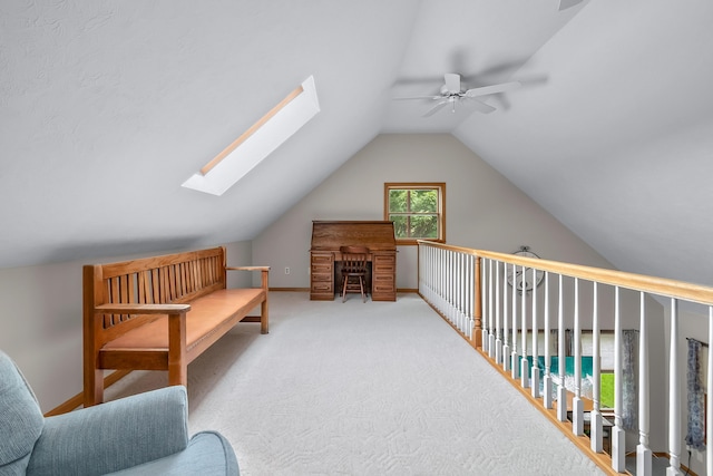 31688 Colon Rd, Colon, MI 49040 - sitting room featuring a ceiling fan, a skylight, vaulted ceiling, and carpet floors