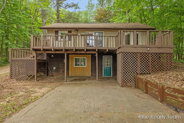 757 E Sidney Rd, Stanton, MI 48888 - view of front facade featuring a wooden deck