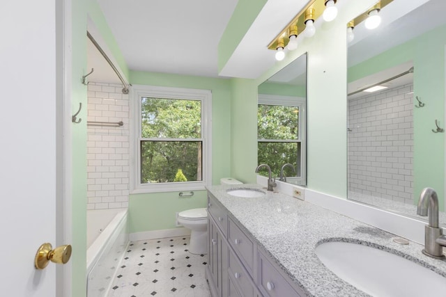 2647 Manitoba Ct NE, Grand Rapids, MI 49525 - full bathroom featuring double vanity, tile patterned floors, and bathing tub / shower combination